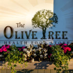 The Olive Tree Health Food Store sign